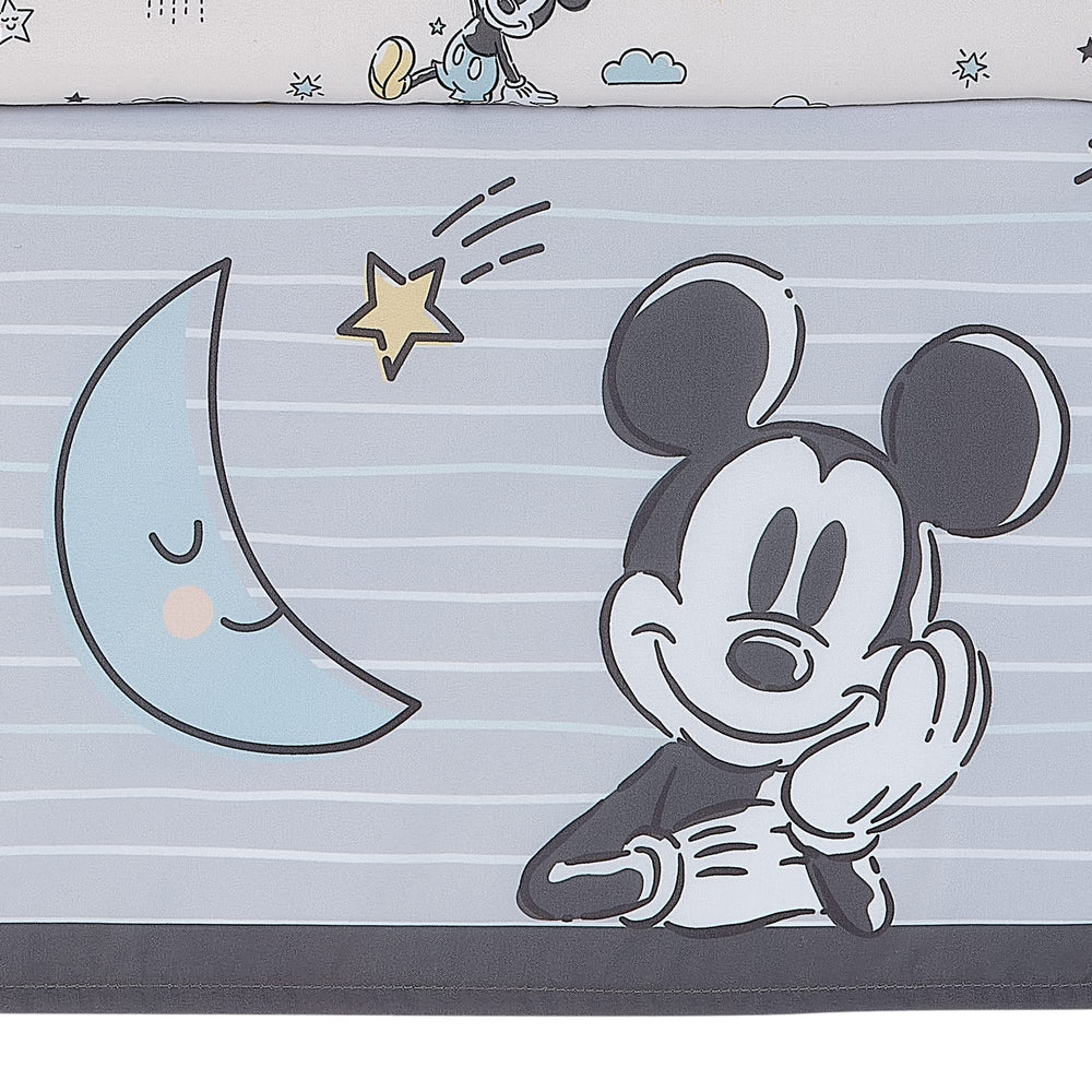Lambs & Ivy Moonlight Mickey in blue shorts detail for playful design.