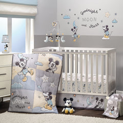 Lambs & Ivy Moonlight Mickey quilt close-up featuring patchwork for cozy nights.