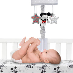 Lambs & Ivy magical music mechanism offers soft melodies for baby calm.