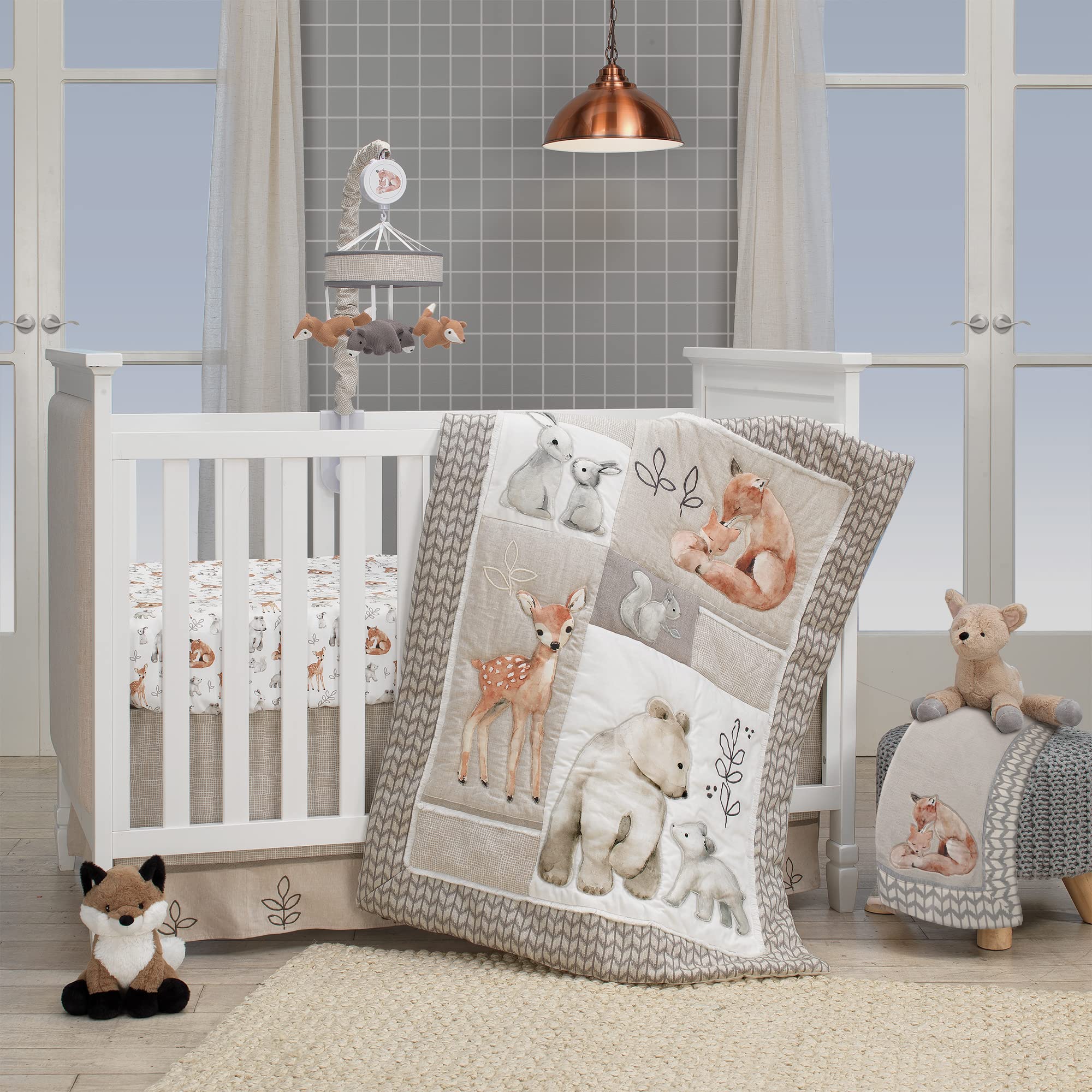 Lambs & Ivy Painted Forest knitted bear close-up highlighting cozy nursery appeal.