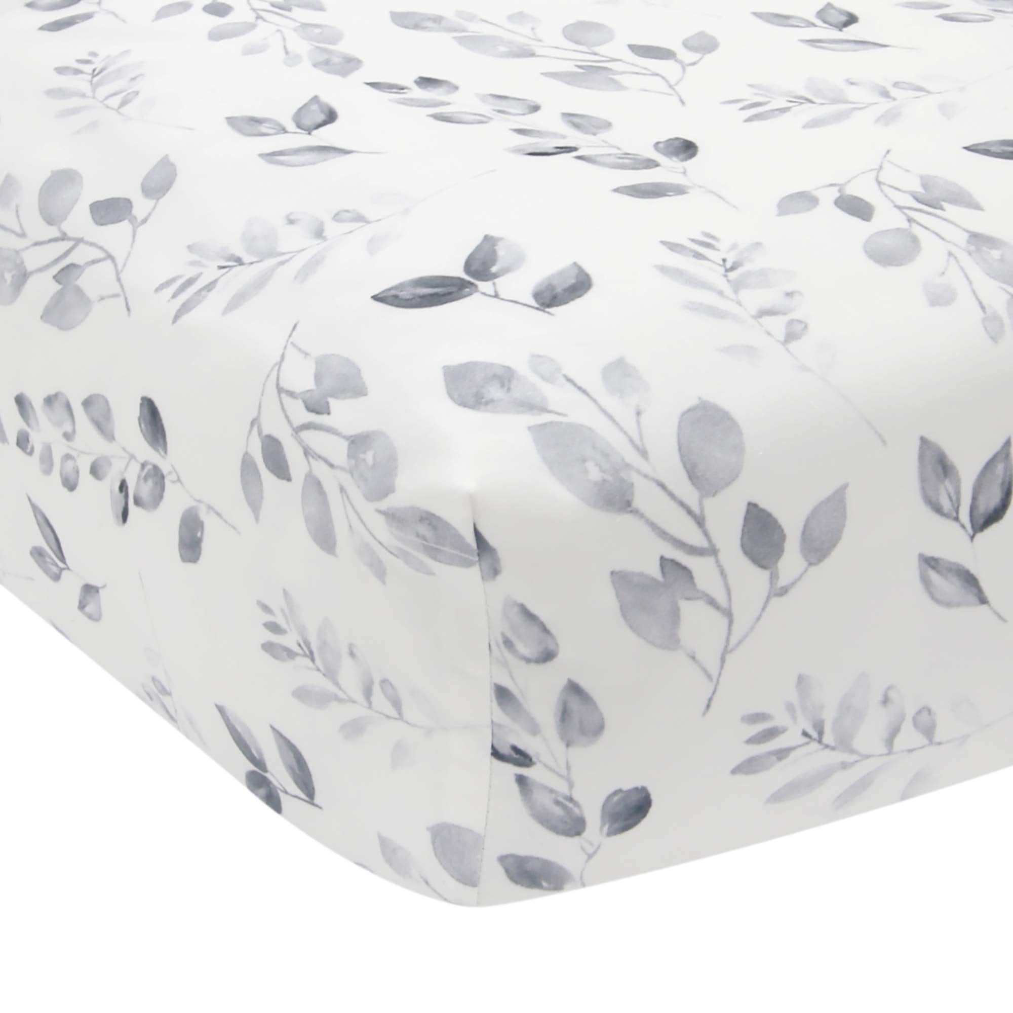 Lambs & Ivy Painted Forest crib sheet features gray watercolor leaves for a soft, coordinated nursery.