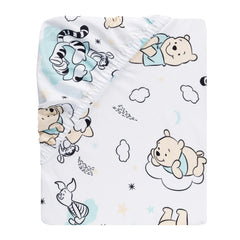 Lambs & Ivy Disney Winnie the Pooh Hugs sheet shows elastic all-around secure fit.