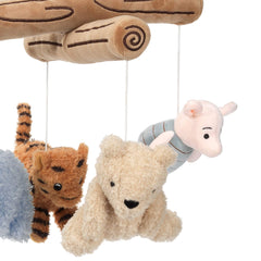 Lambs & Ivy Pooh plush animals rotate to encourage visual tracking and focus.