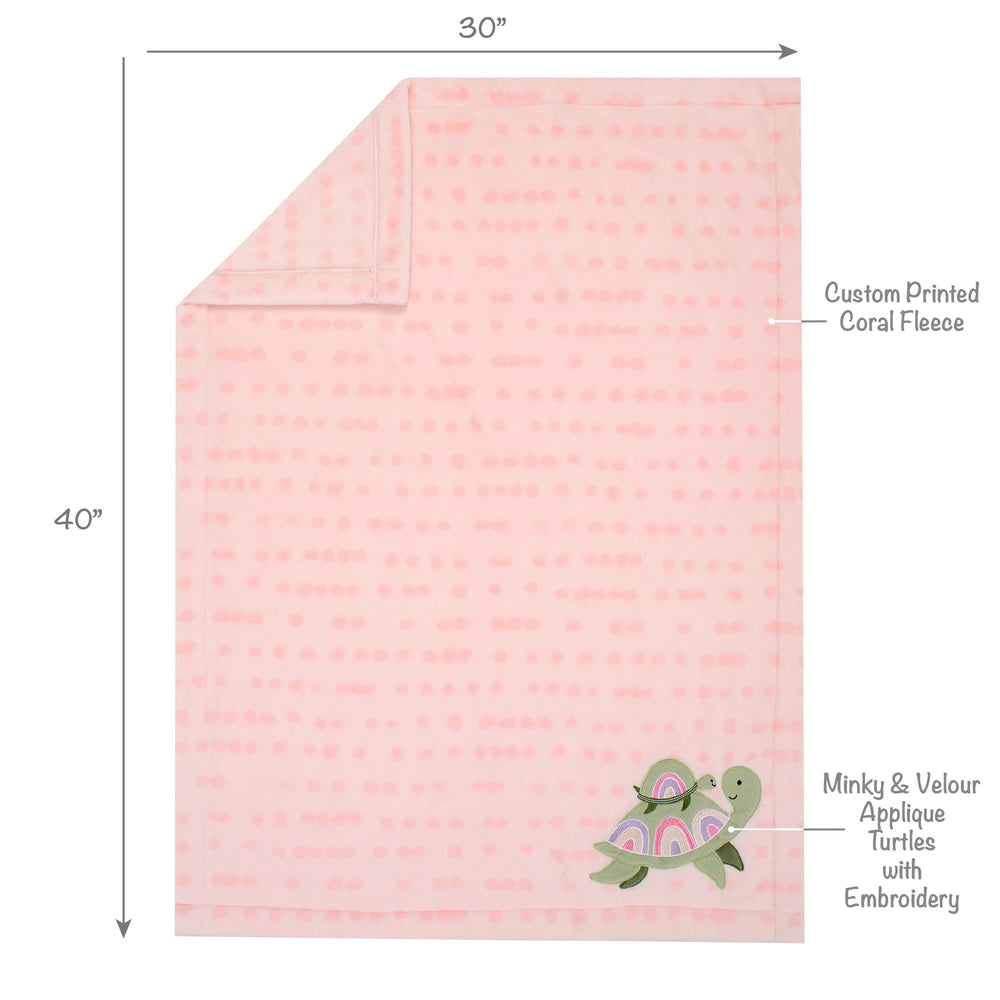 Lambs & Ivy Sea Dreams rainbow shell detail adds playful nursery charm.