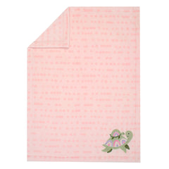 Lambs & Ivy Sea Dreams turtle applique with soft minky for soothing snuggles.
