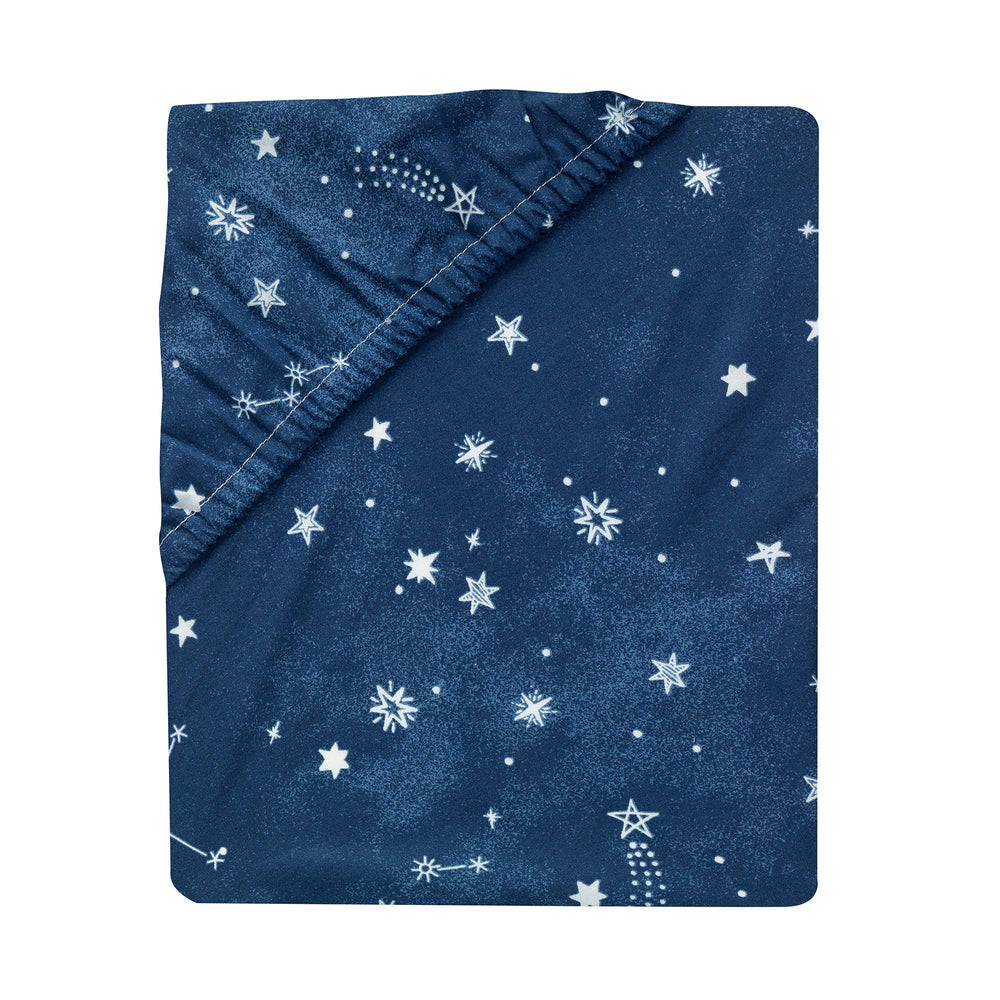 Lambs and Ivy Sky Rocket elastic edge keeps a secure fit on standard crib mattresses