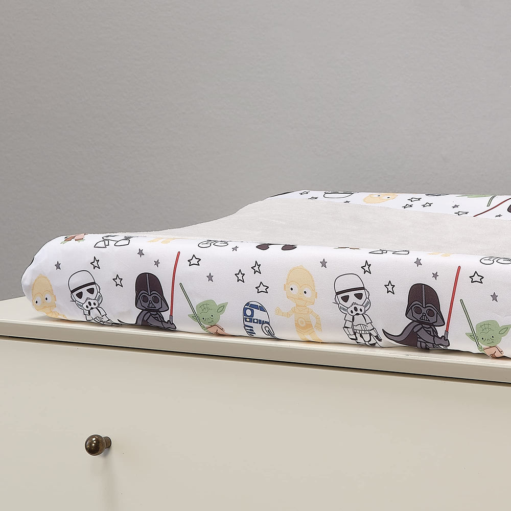 Lambs & Ivy Star Wars cover shows buttonholes for safety straps to keep baby secure