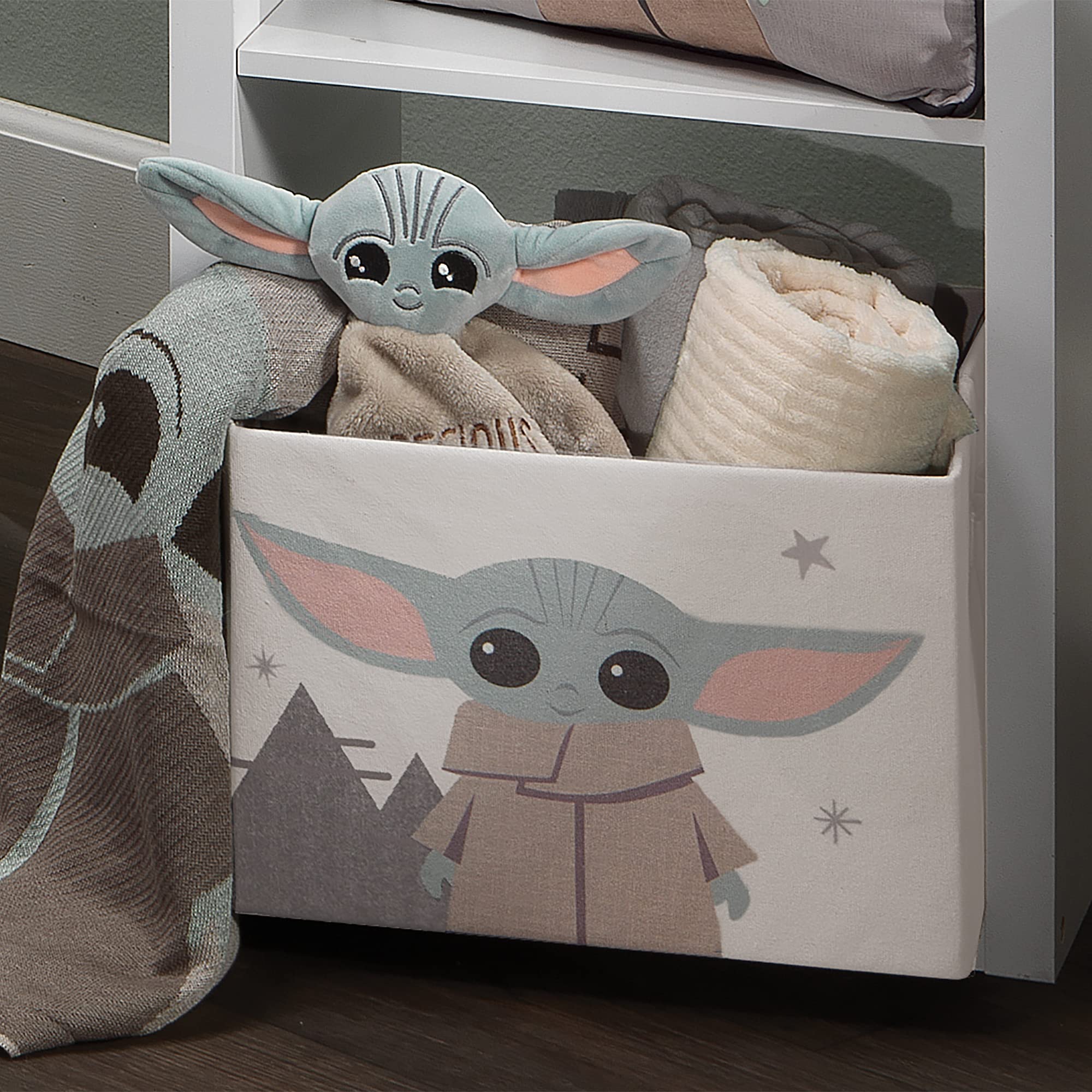 Lambs & Ivy Grogu bin dimensions are 12.5in x 11in x 9in for nursery storage