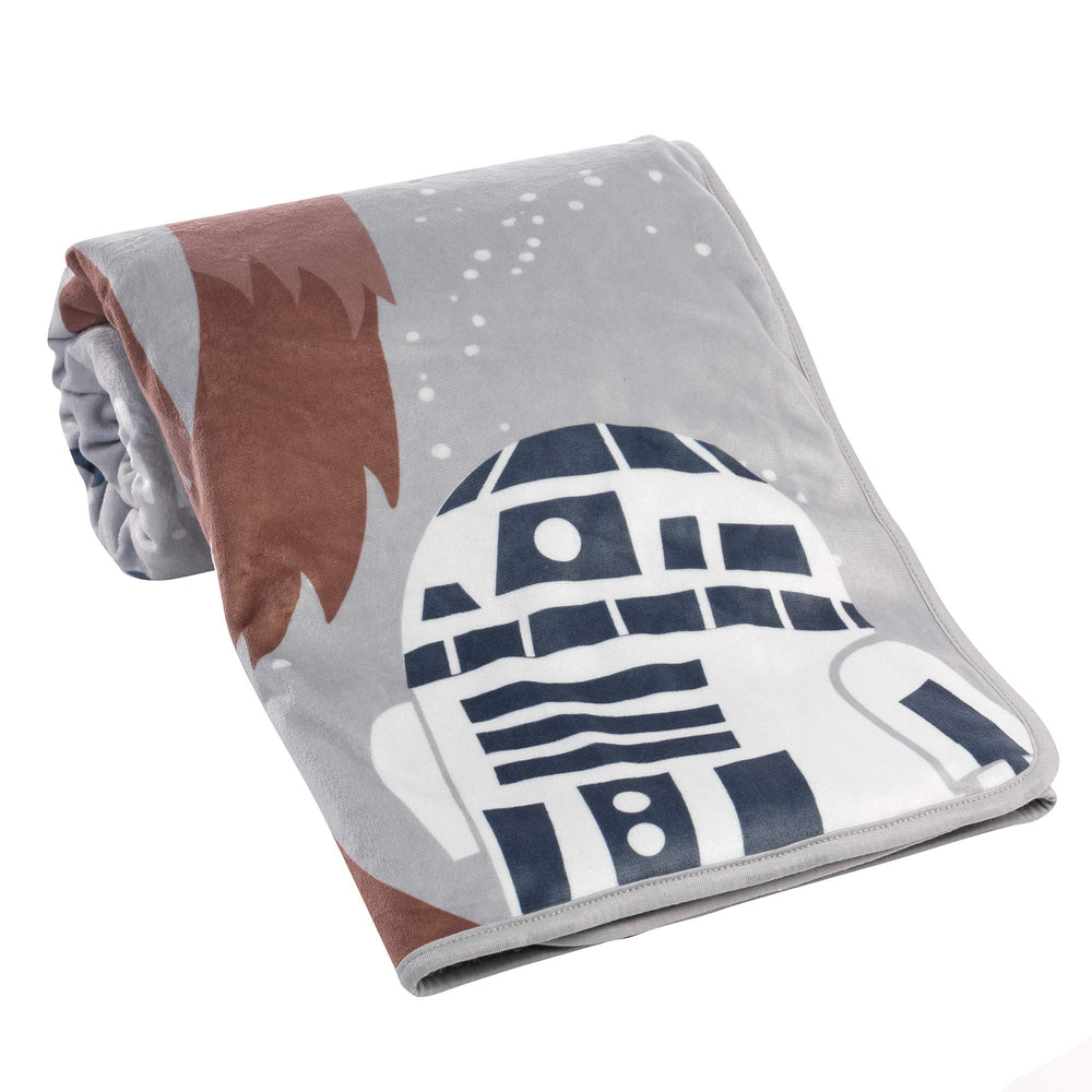 Lambs & Ivy Rebels blanket front shows R2-D2 and C-3PO for on-the-go warmth.
