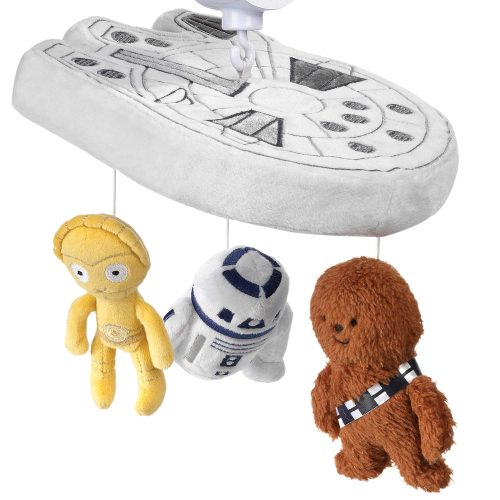 Lambs & Ivy Star Wars mobile characters rotation supports sensory exploration.