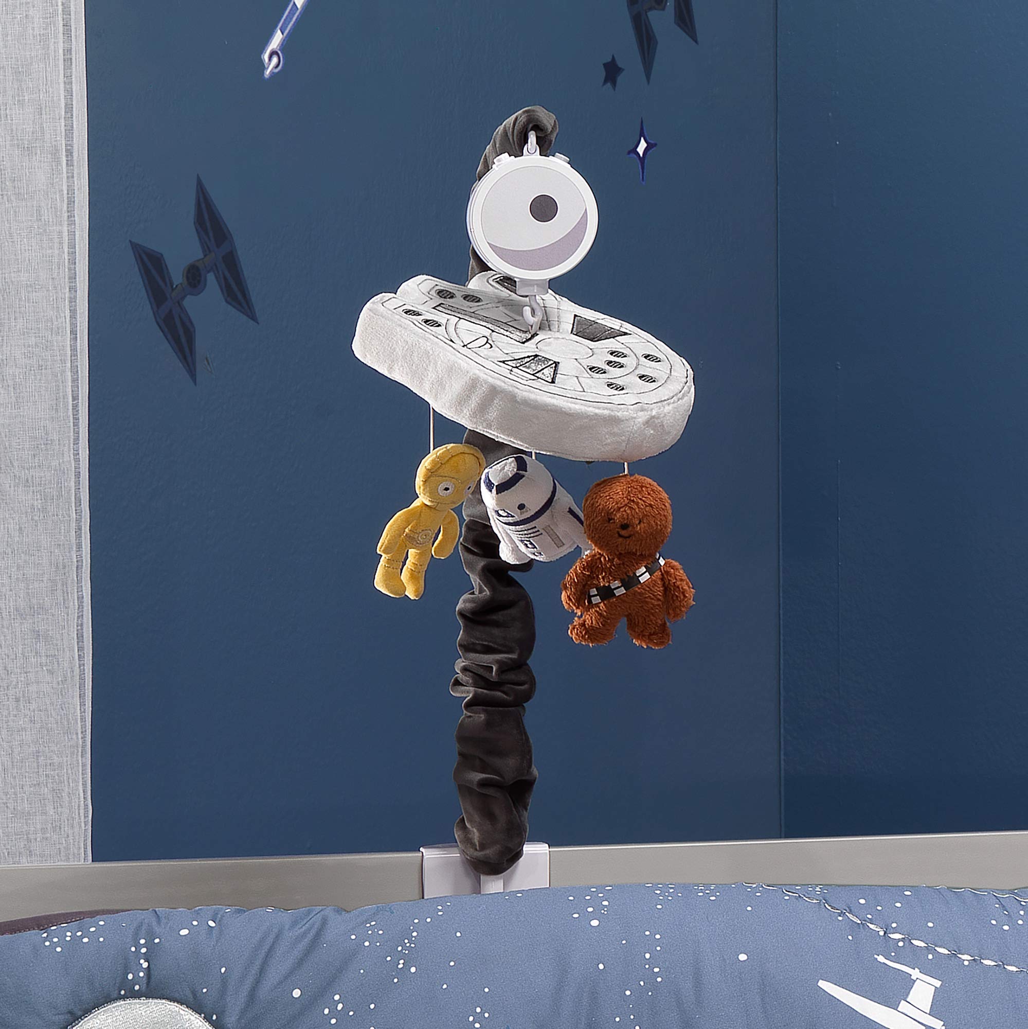 Lambs & Ivy Star Wars mobile visual stimulation aids early awareness during crib time.