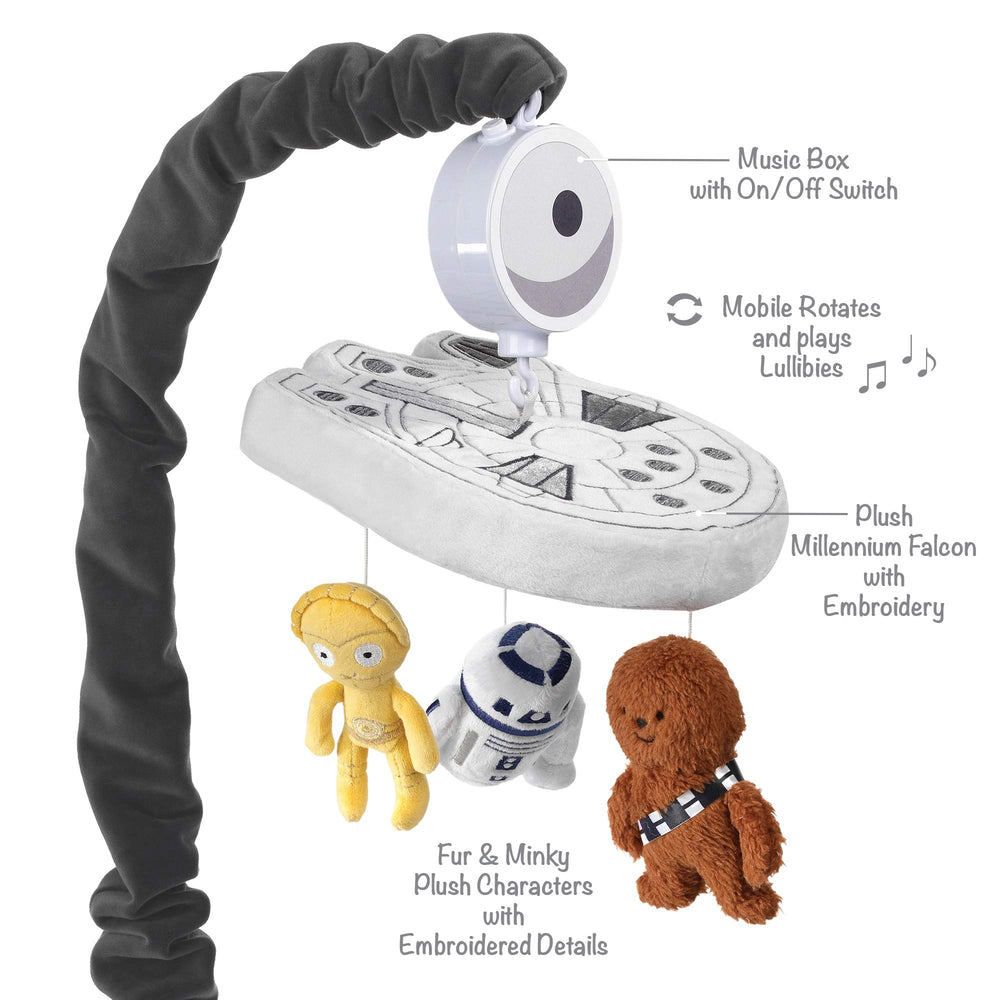 Lambs & Ivy Millennium Falcon volume control panel helps caregivers adjust sound.