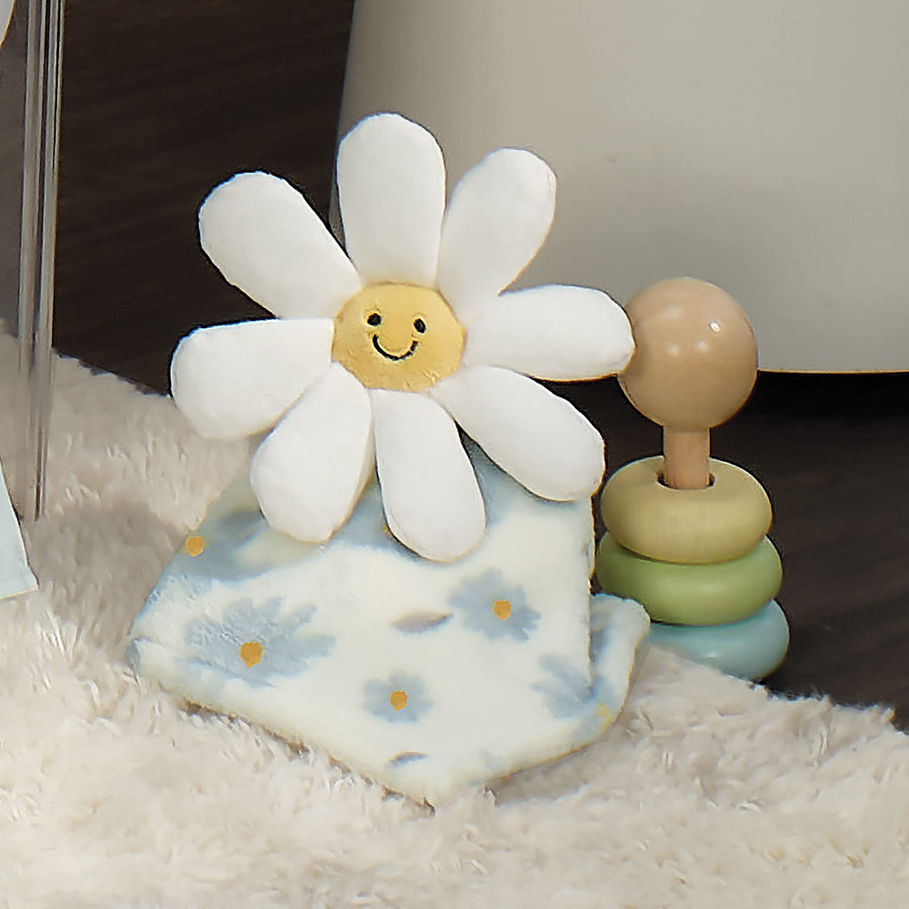 Lambs & Ivy Sweet Daisy Lovey ultra-soft fleece texture for cozy snuggles.