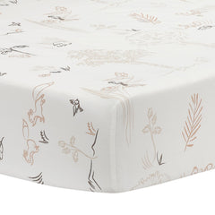 Lambs & Ivy Treetop Fox forest scene sheet offers breathable cotton comfort for crib nights.