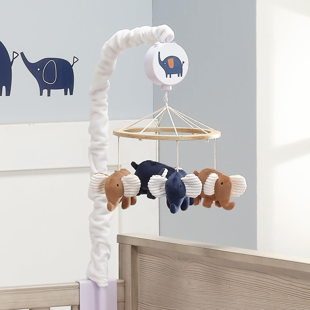 Lambs & Ivy volume control makes adjusting sound easy for caregivers.