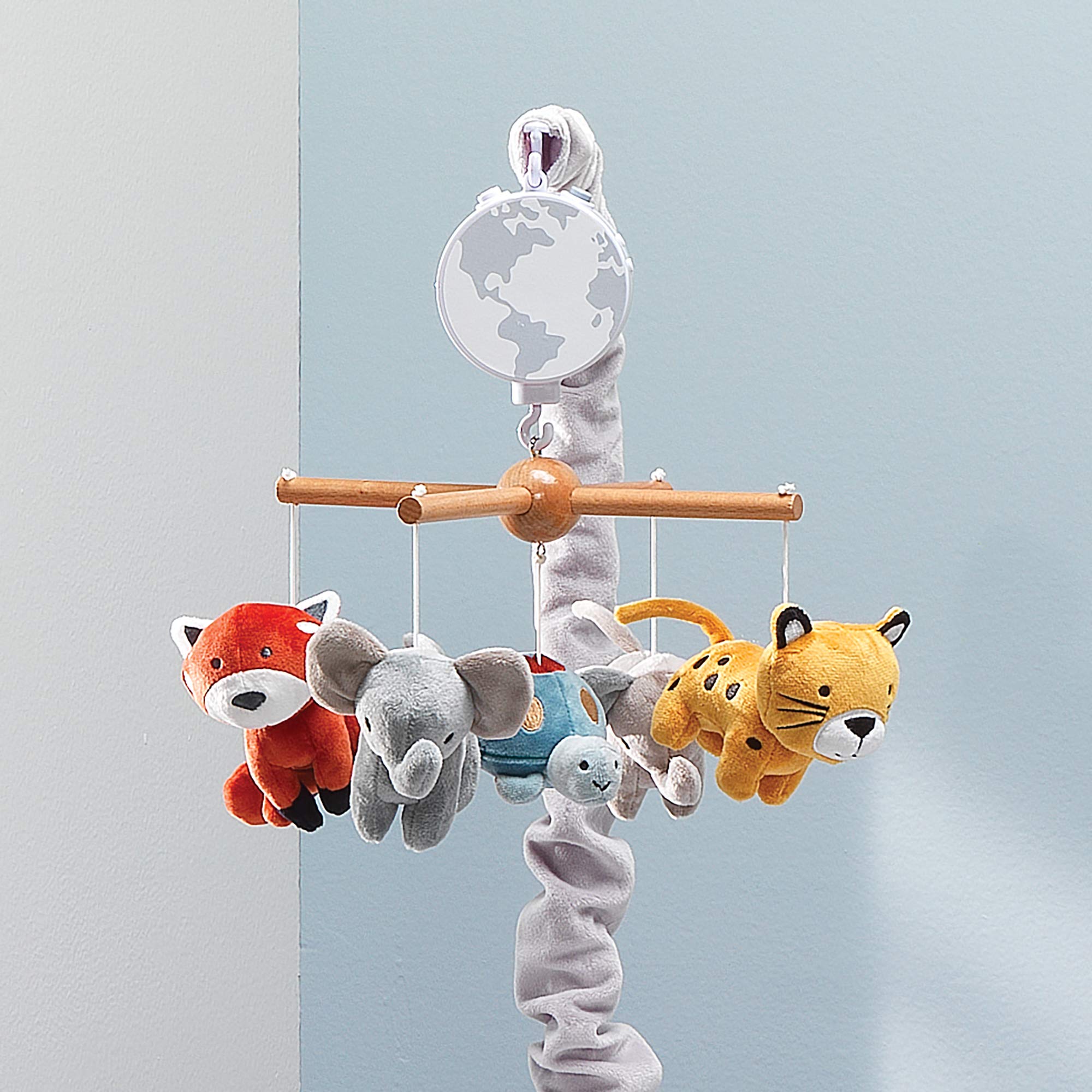Lambs & Ivy Wild Life Musical Mobile includes Rock-A-Bye-Baby for soothing bedtime routines.