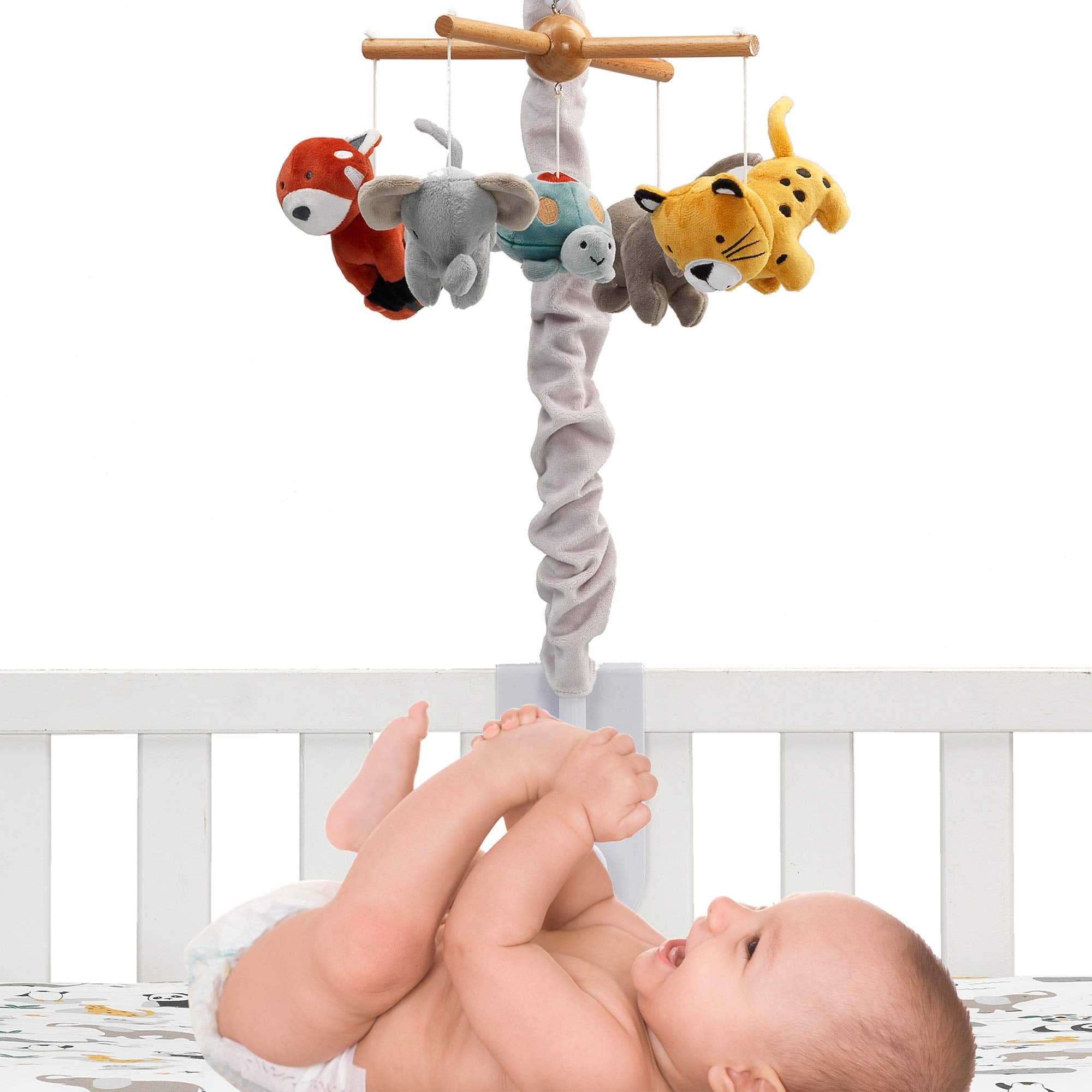 Lambs & Ivy Wild Life Musical Mobile demonstrates gentle rotation to engage senses and soothe baby.