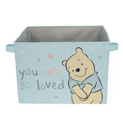 Lambs & Ivy Winnie the Pooh blue foldable storage basket—two side handles for easy carrying.