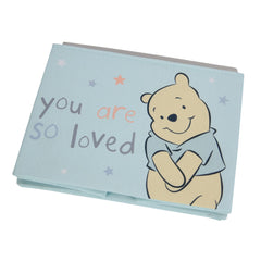 Lambs & Ivy Winnie the Pooh blue foldable storage basket—holding toys or blankets in playroom.