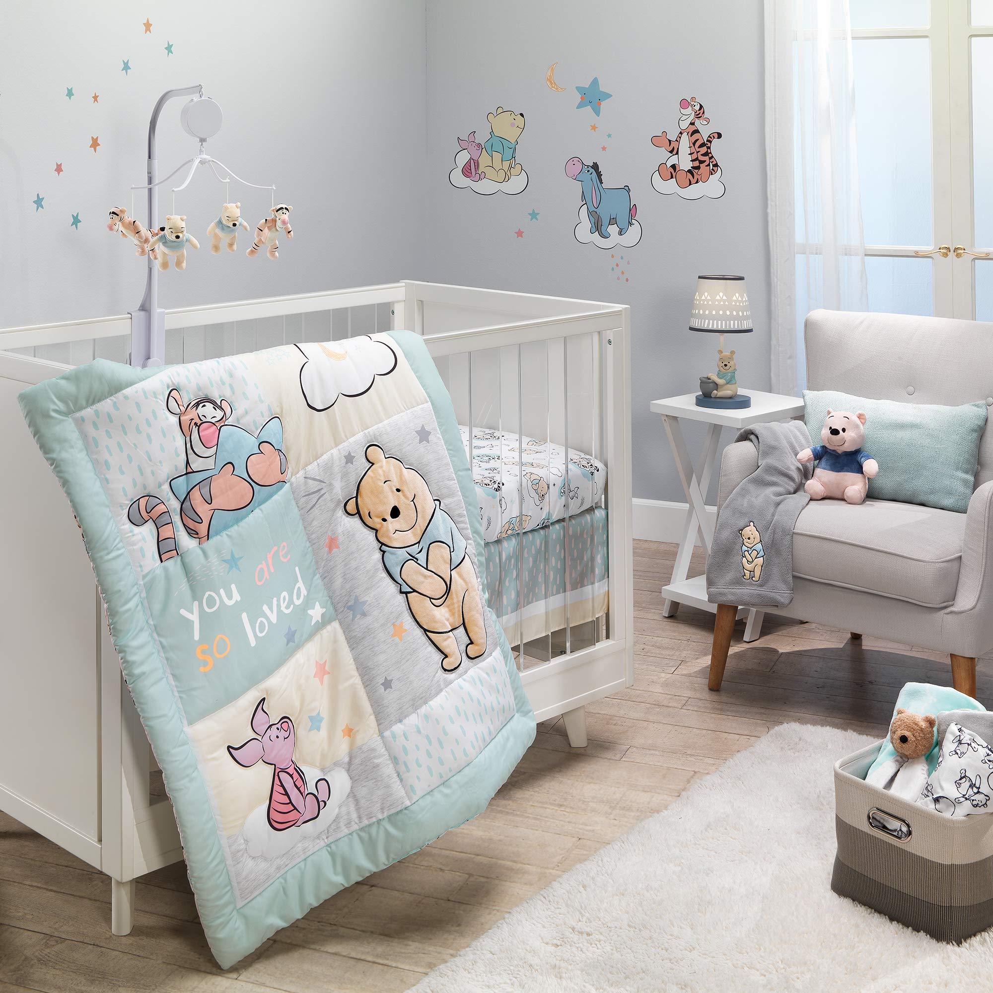 Lambs & Ivy Winnie the Pooh Hugs crib sheet machine washable for busy parents.