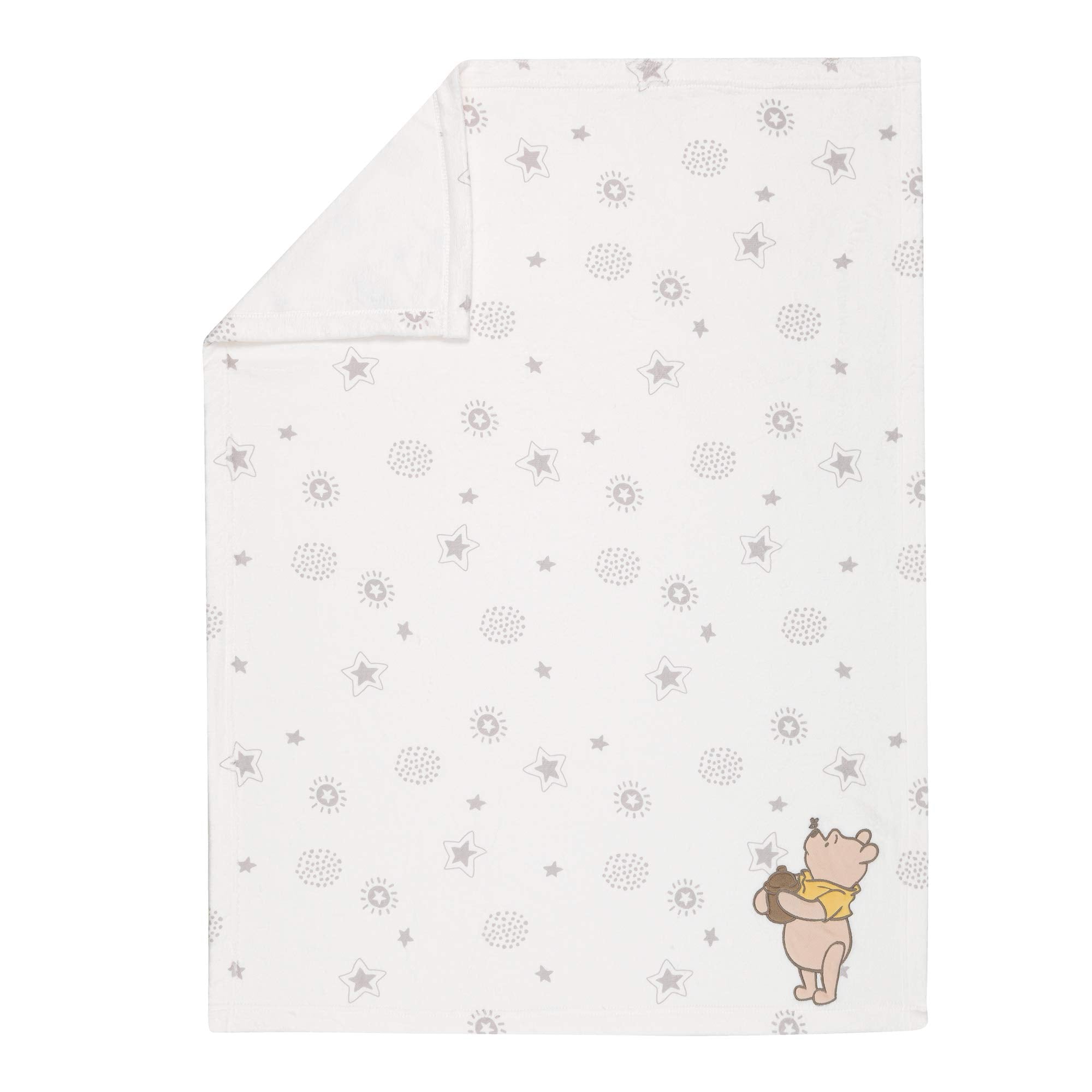 Lambs & Ivy Pooh stardust print invites dreamy naps