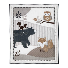 Lambs & Ivy bear embroidery enhances premium nursery decor with thoughtful stitching