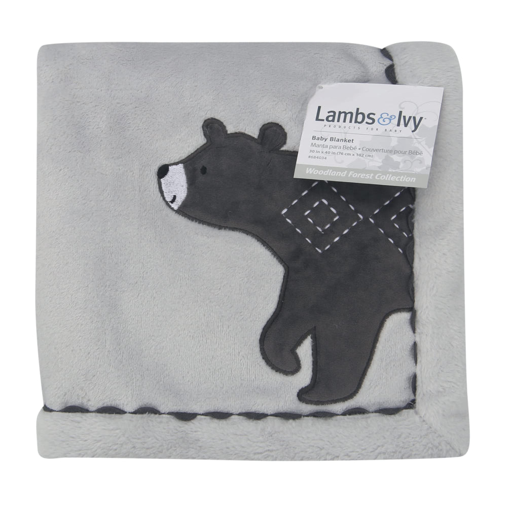 Lambs & Ivy blanket folded for travel warmth in stroller or car seats.