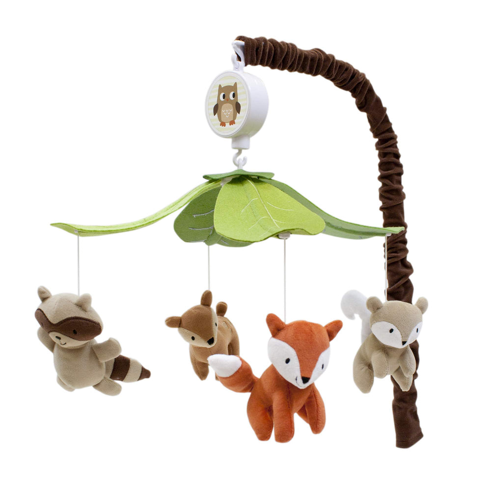 Lambs & Ivy Woodland Tales mobile with forest animals creating a calming bedtime cue.