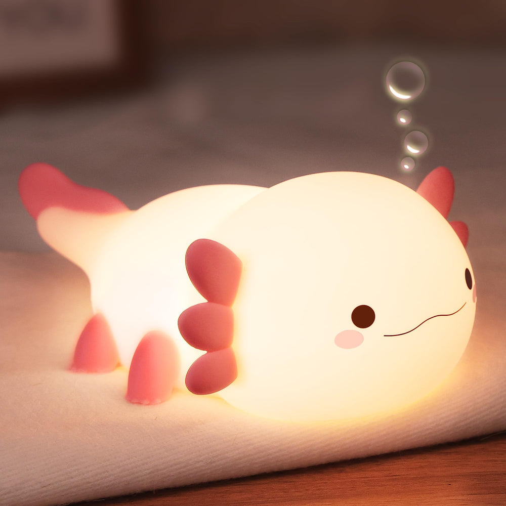 Lampeez axolotl night light glows softly to enhance a cozy bedtime routine.