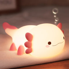 Lampeez axolotl night light glows softly to enhance a cozy bedtime routine.