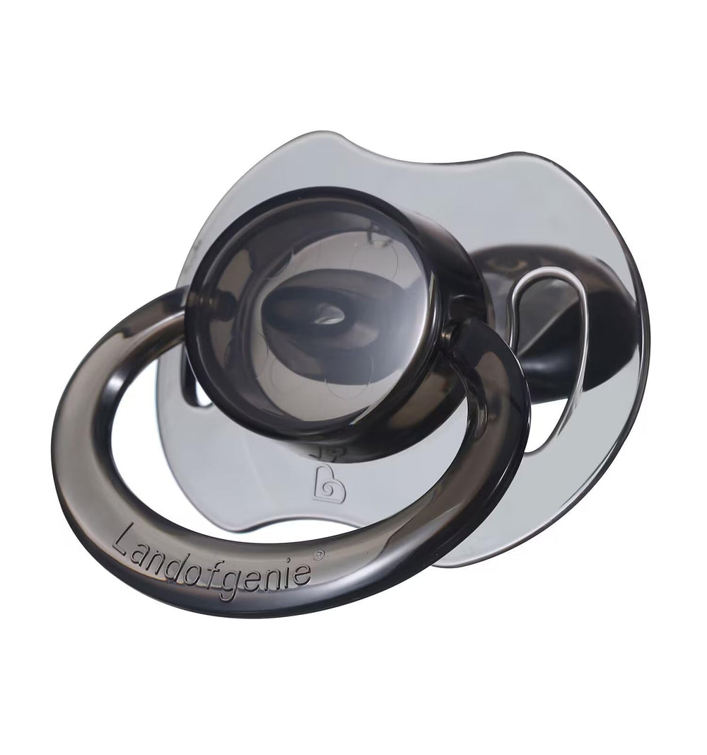 Landofgenie pacifier side angle highlights transparent build and modern bone shape.