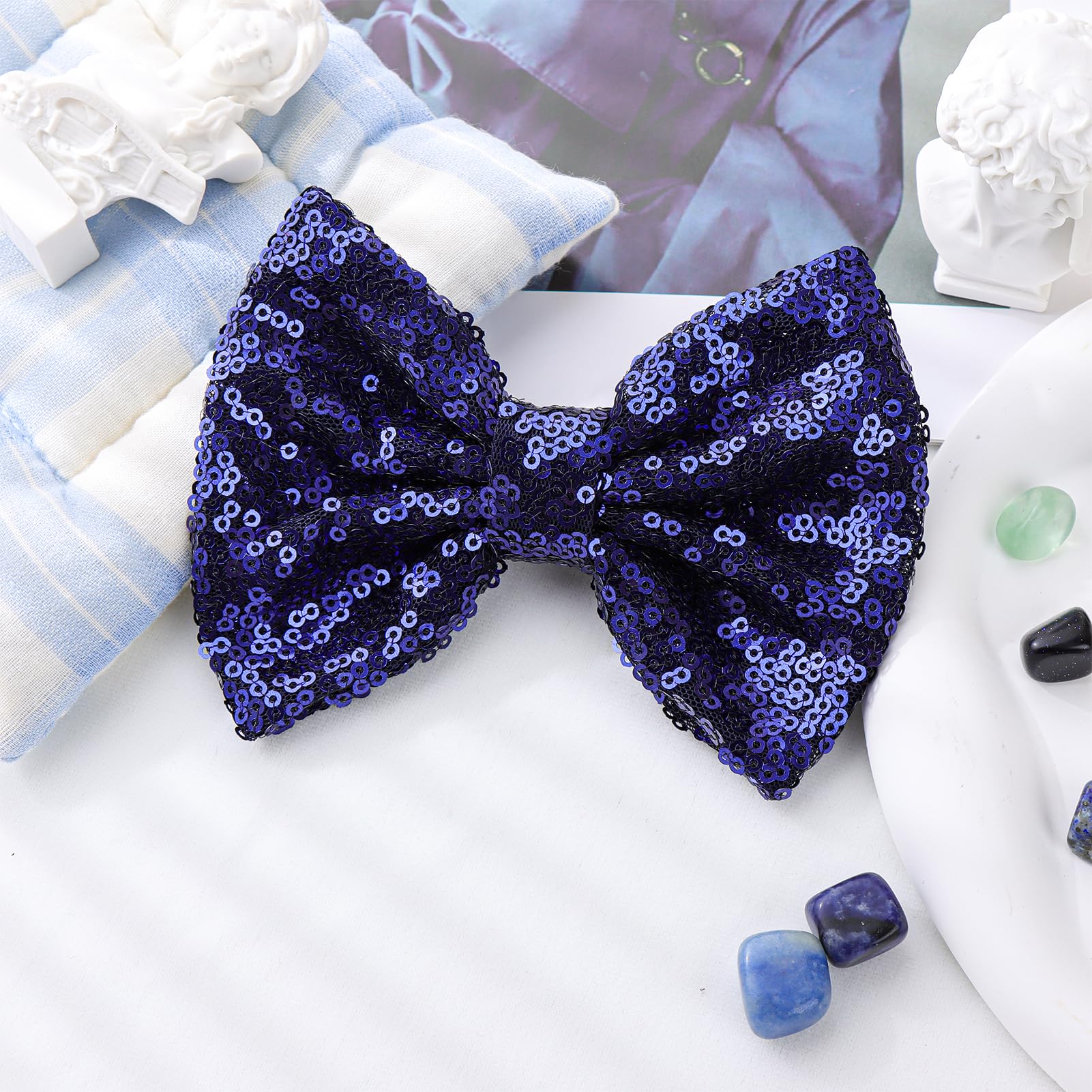 Lanmerry 5-inch sequin bow clip secures styles for busy kids.