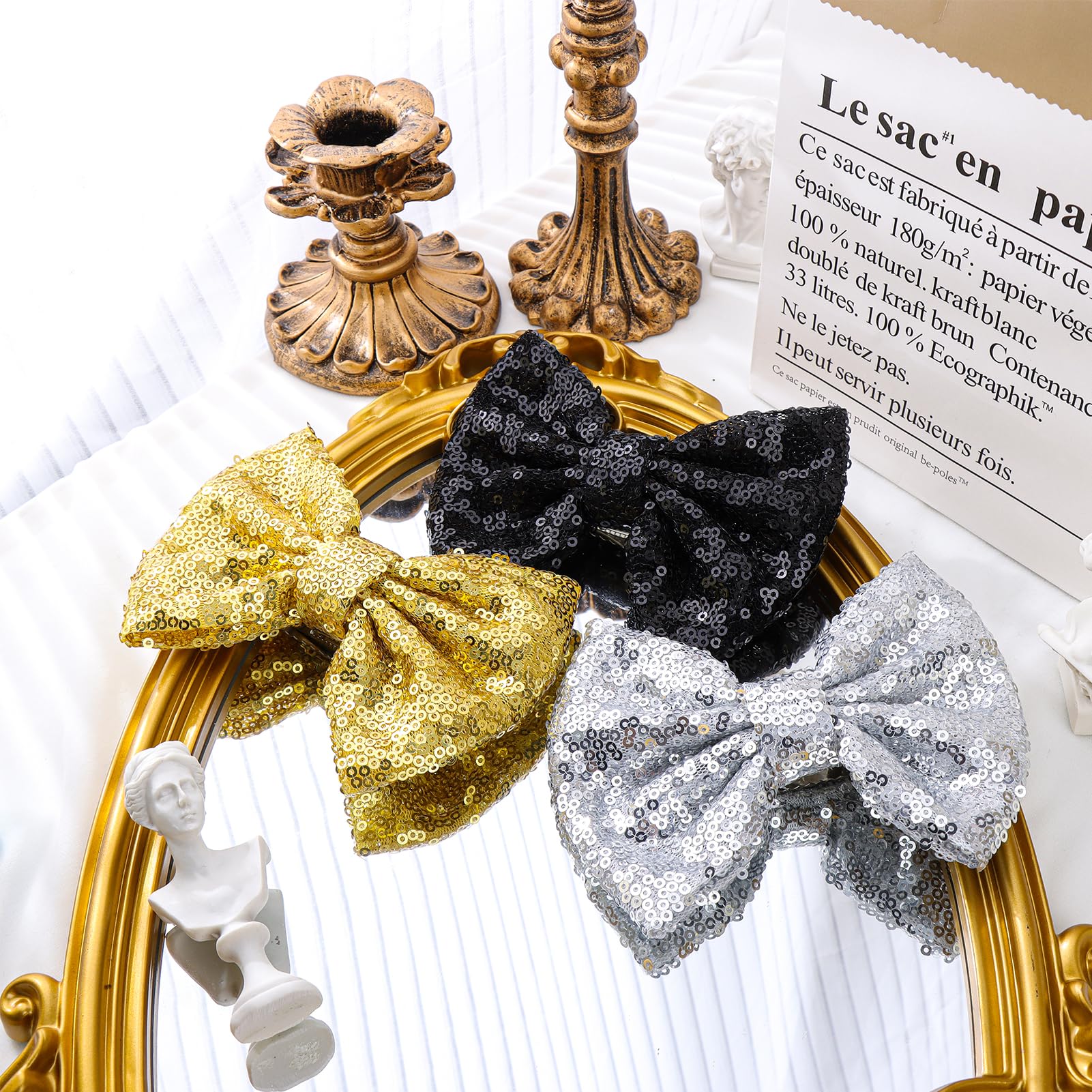 Lanmerry Alligator Clip Sequin Bow in silver brings subtle glow to outfits.