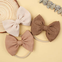 Lanmerry handmade headband product image emphasizes craftsmanship and soft fabric.