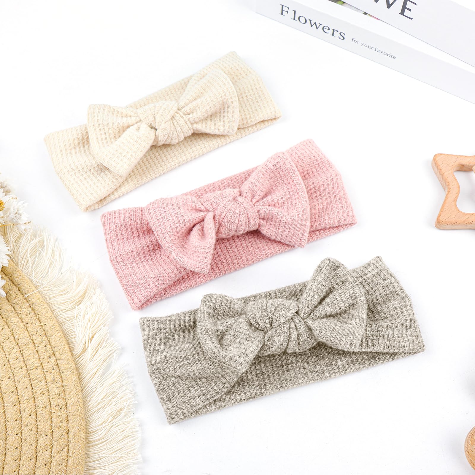 Lanmerry baby girl wearing headband demonstrates versatile accessory for photos