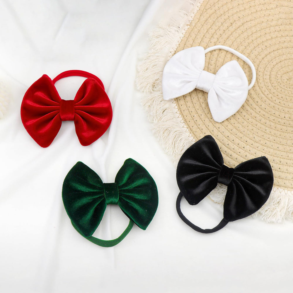 Lanmerry baby headbands worn on baby during family photo showing gentle fit