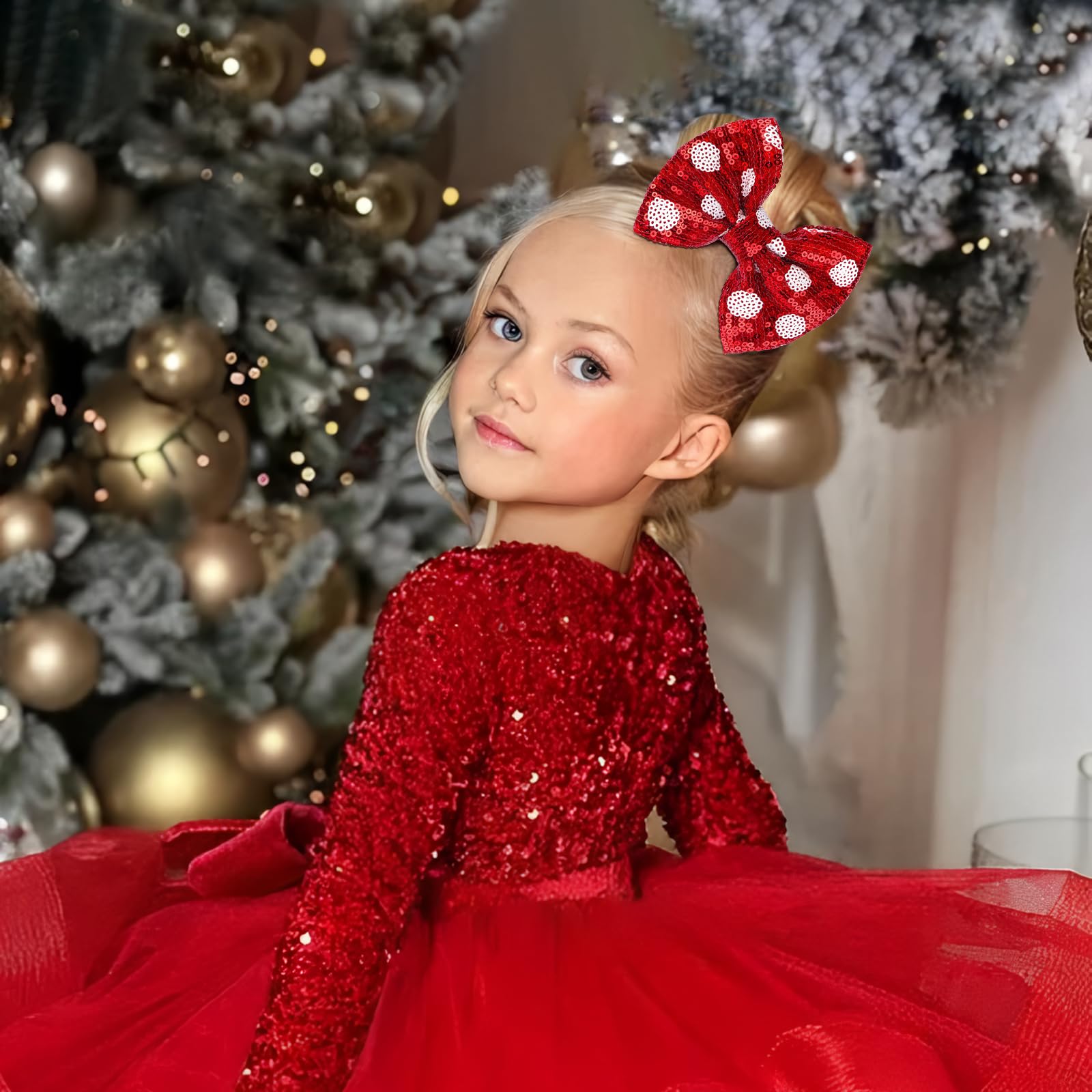 Lanmerry baby sequin bow clip adds sparkle while staying secure on tiny tresses.