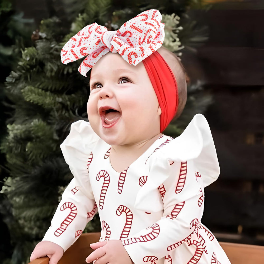 Lanmerry candy cane bow headband — durable elastic fit for growth.