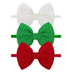 Lanmerry Christmas baby bows on green headband offering newborn comfort.