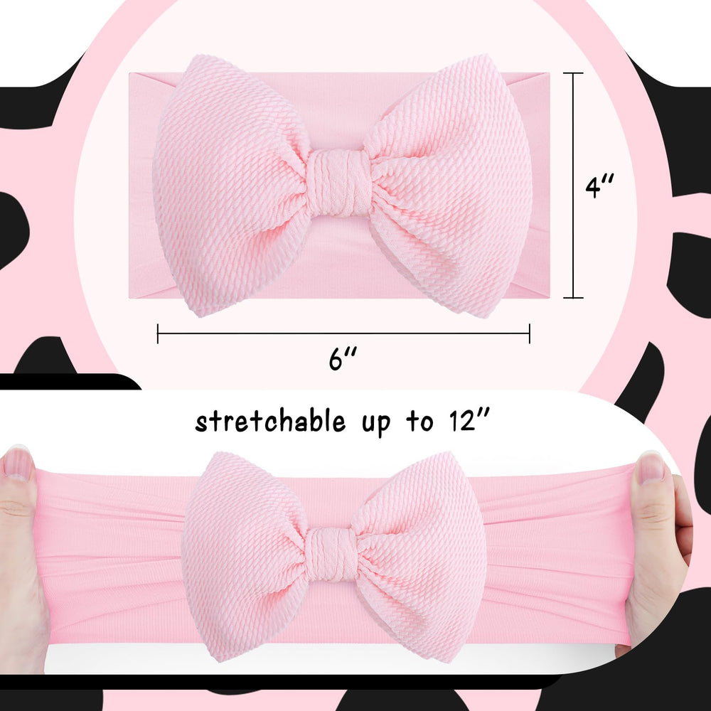 Lanmerry cow-print bow on headband demonstrates secure fit.