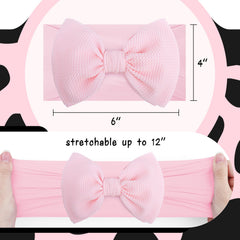 Lanmerry cow-print bow on headband demonstrates secure fit.