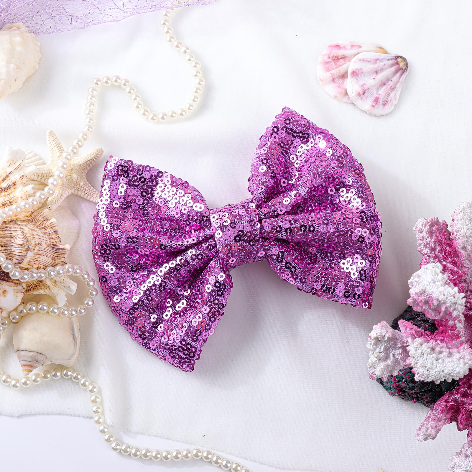 Lanmerry sequin bow clip in purple enhances outfits for occasions and daily wear.