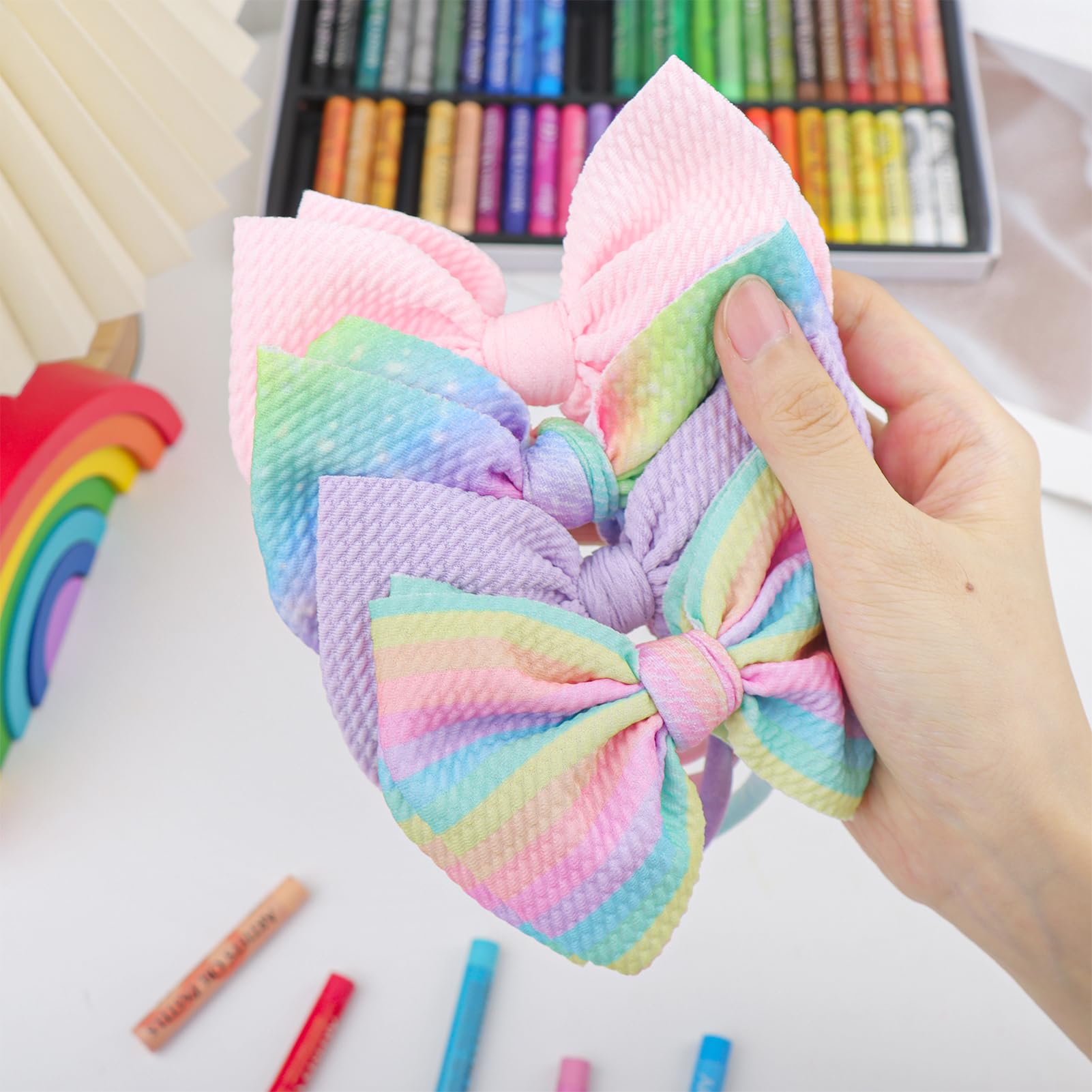 Lanmerry gift-set of four bows for baby showers.