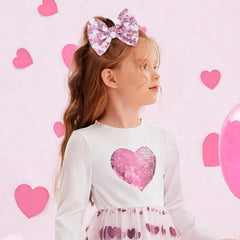 Lanmerry glitter sequin heart bow close-up in red, showcasing durable fabric and sparkle.