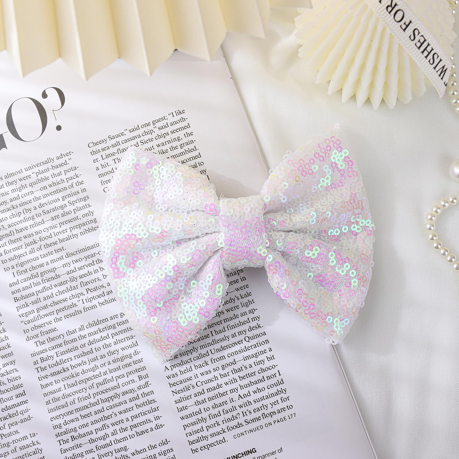 Lanmerry bow complements teen and women outfits with subtle sparkle.