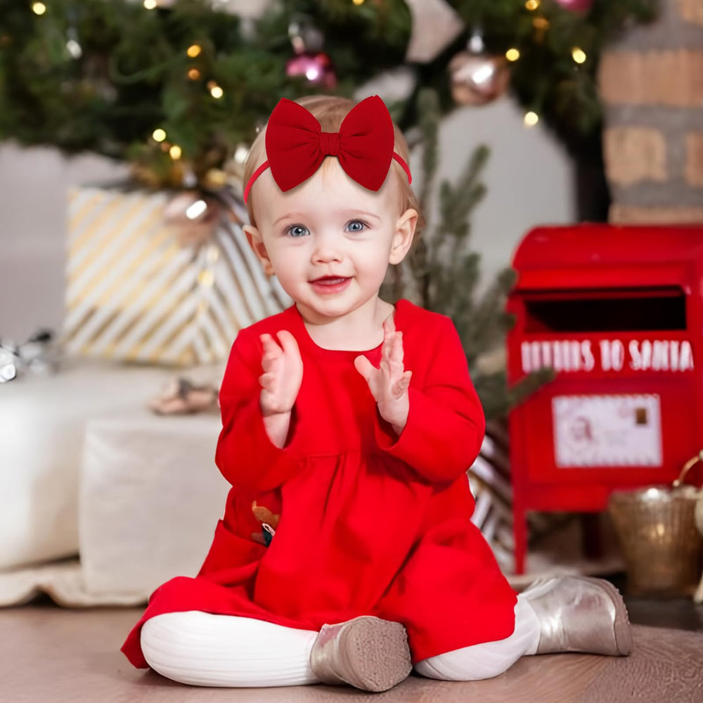 Lanmerry red hair bow on nylon headband provides secure fit for toddlers.