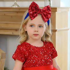 Lanmerry sequin bow hair accessory adds sparkle for celebrations.