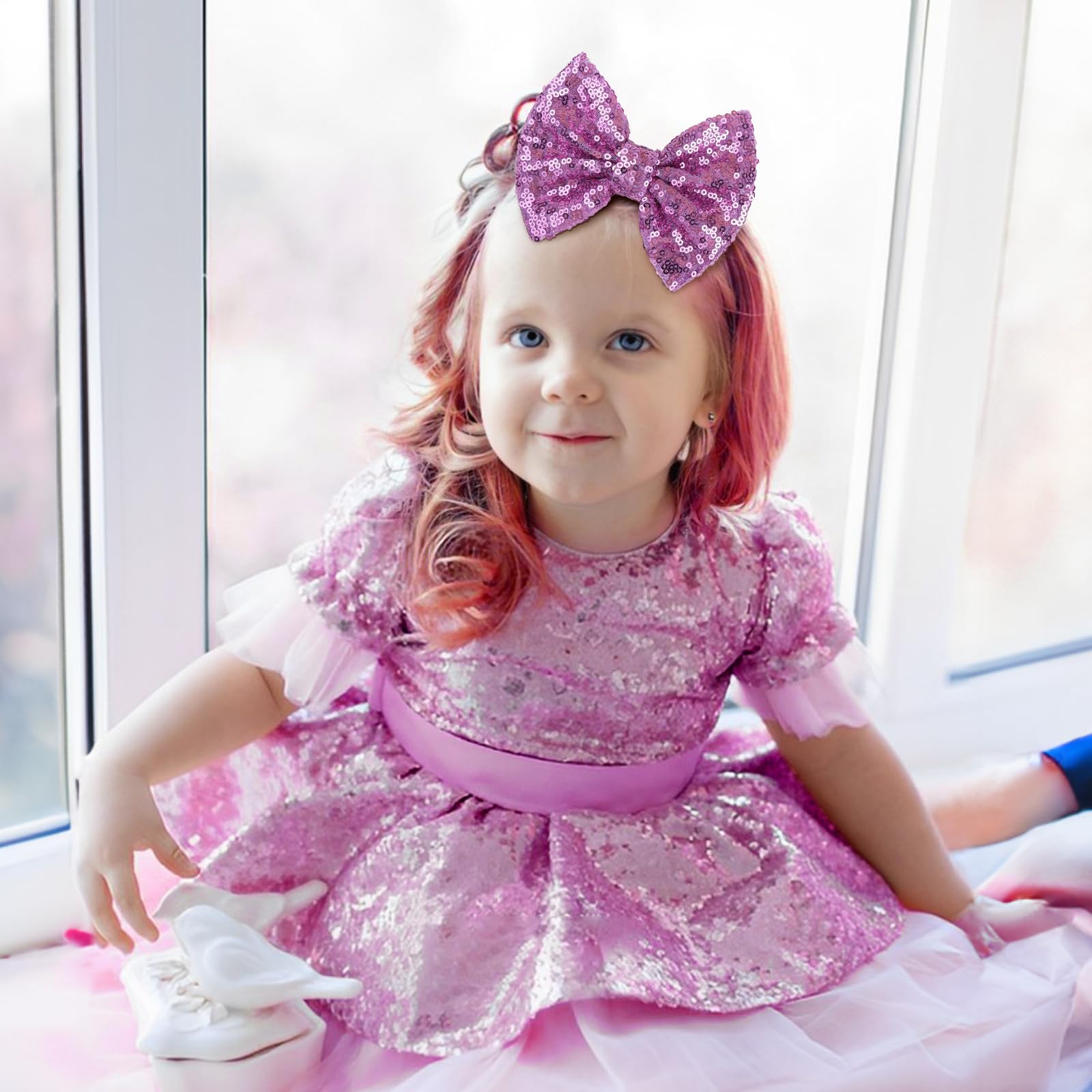 Lanmerry purple sequin bow clip adds cute flair to girls' hairstyles.