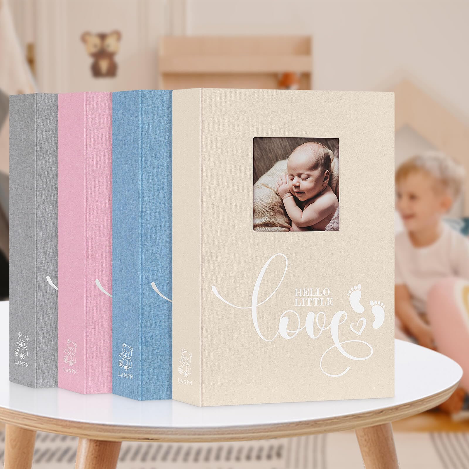 Lanpn slip-in photo book in pink makes a thoughtful baby shower gift