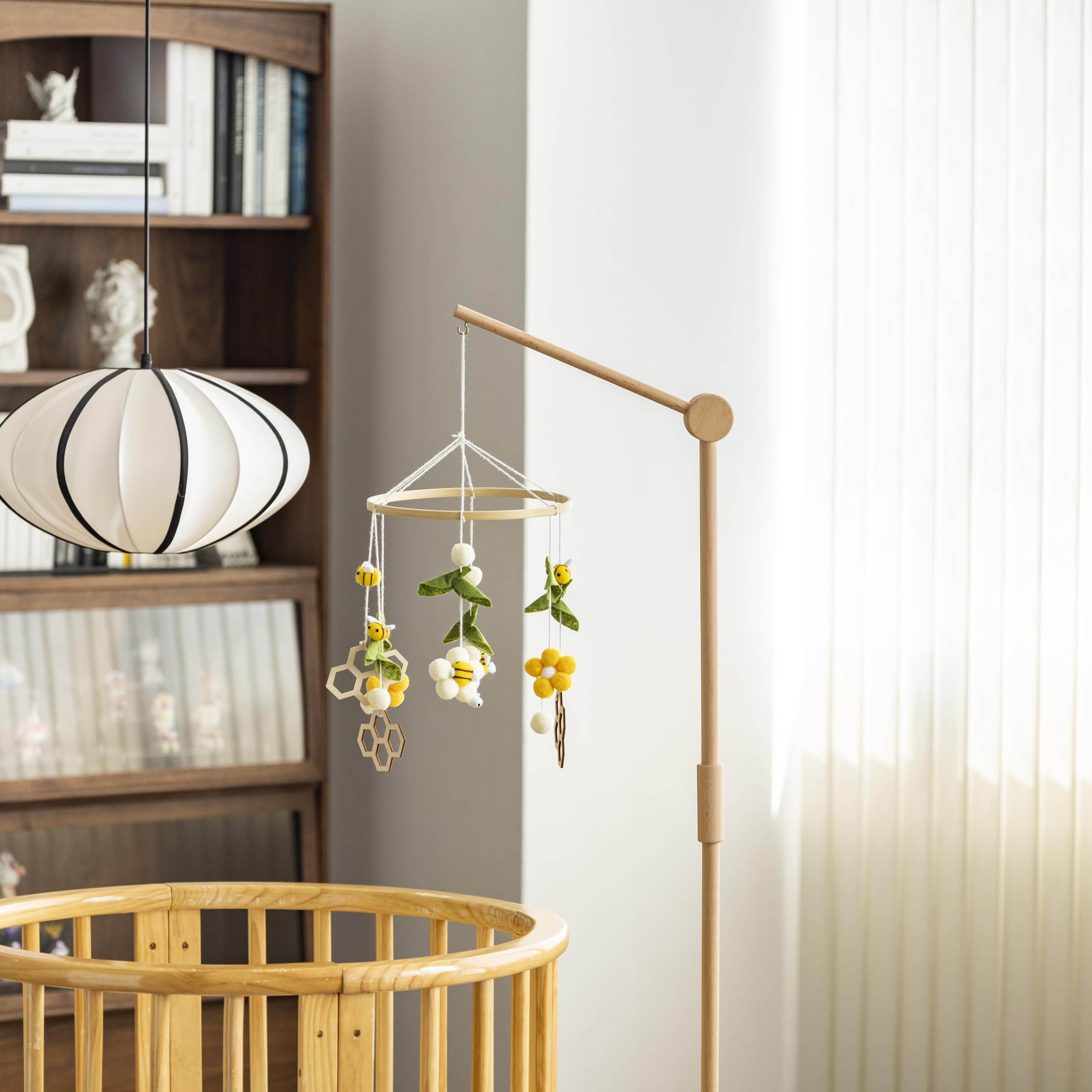 Lanttoe boho nursery decor idea adds stylish, flexible space for play or nap.